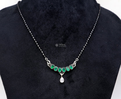 925 sterling silver black beads mangalsutra necklace with waved design and cut stone pendant, traditional style brides jewelry from TRIBAL ORNAMENTS.