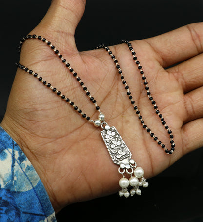 Sterling silver floral beaded chain necklace with pearl pendant, ideal for gifting, by TRIBAL ORNAMENTS.