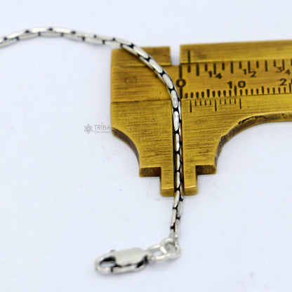Sterling silver 1.5mm solid fancy chain necklace by TRIBAL ORNAMENTS, showing intricate craftsmanship and stylish design.