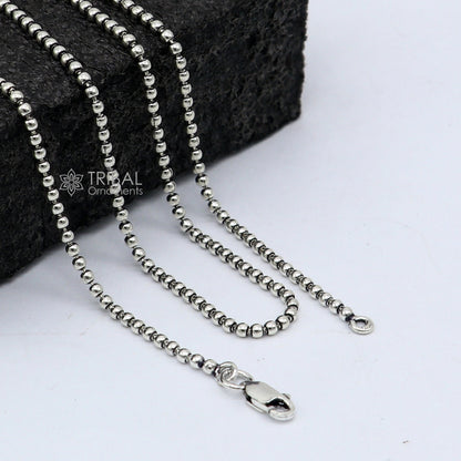 Sterling silver beaded chain necklace by TRIBAL ORNAMENTS featuring 2mm handmade beads, stylish and customizable jewelry for gifting.