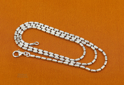 Sterling silver beaded chain necklace by TRIBAL ORNAMENTS, handmade and customized with stylish silver beads, perfect for gifting.