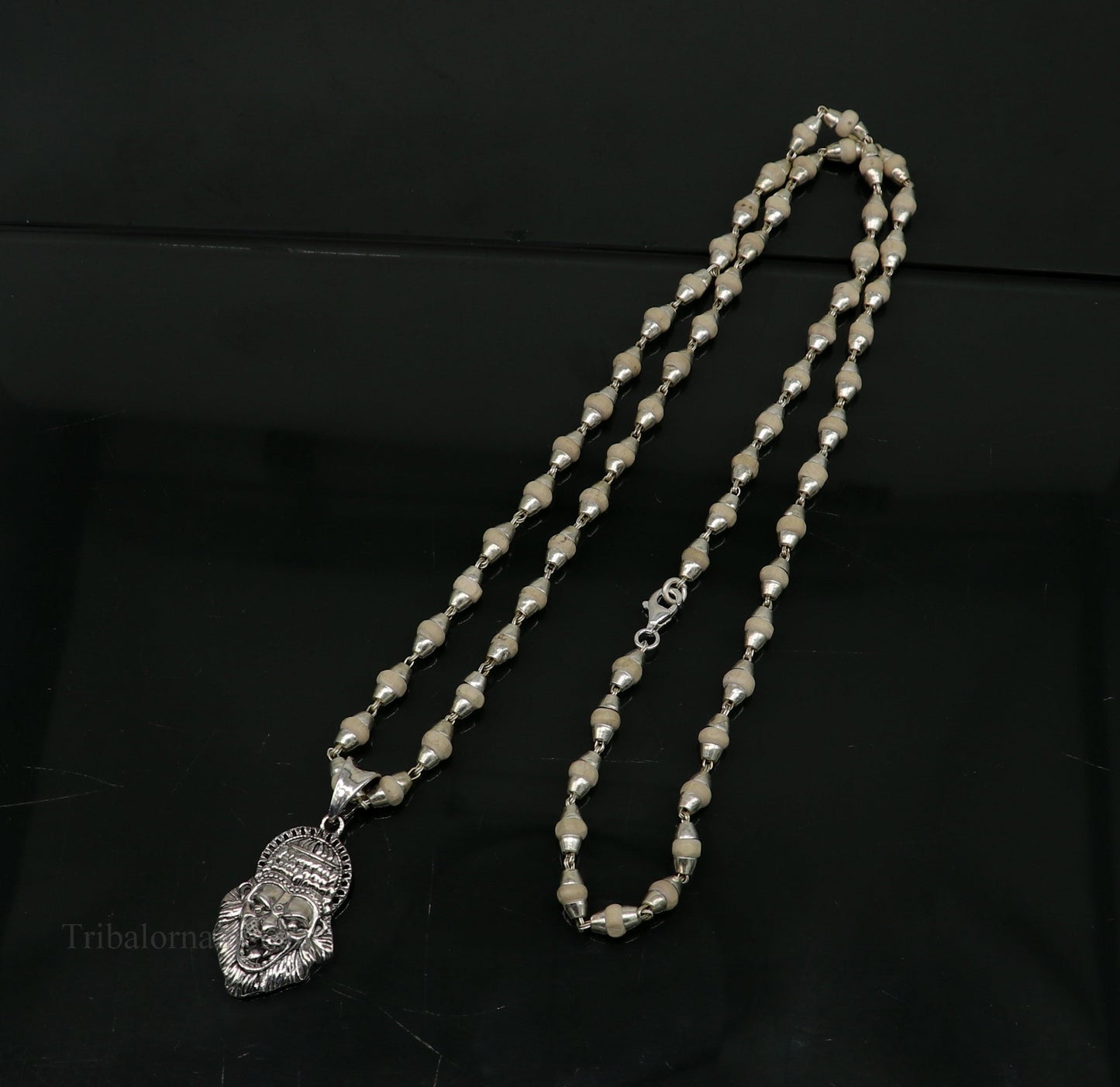 Solid silver Holy Basil rosary with 4mm beads and Lord Vishnu Narsimha pendant, paired with Tulsi mala from Tribal Ornaments.