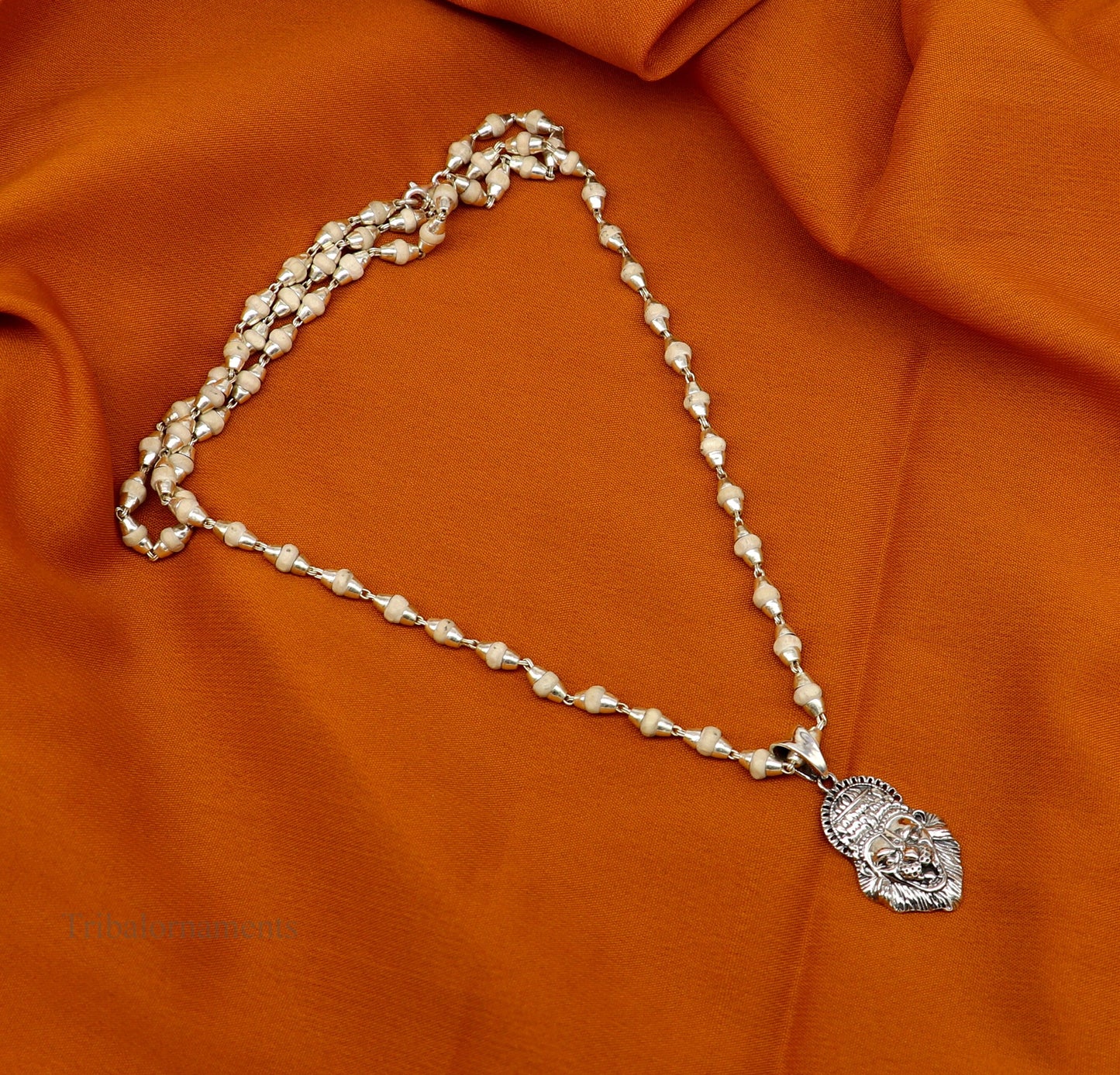 Holy Basil rosary with 4mm silver beads and Lord Vishnu Narsimha pendant, featuring a Tulsi mala set from Tribal Ornaments.