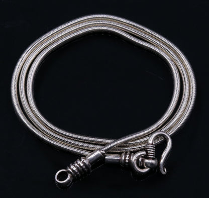 Sterling silver vintage snake chain necklace by Tribal Ornaments, flexible unisex jewelry with antique screw design.