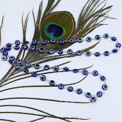 Handmade silver chain necklace with evil eye beads by TRIBAL ORNAMENTS, designed to protect from negative energy, 18-30 inches.