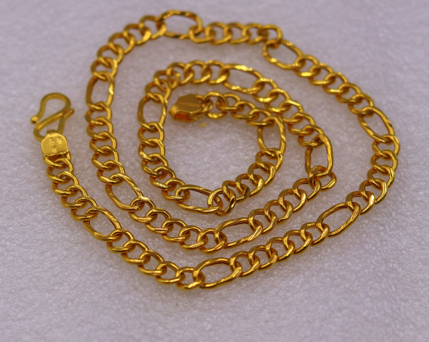 22K yellow gold handmade Figaro link chain necklace by TRIBAL ORNAMENTS, unisex, stylish, and certified for elegant wear.