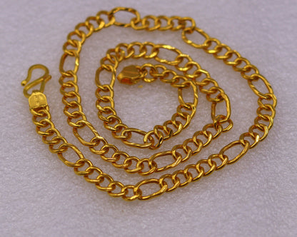 22K yellow gold handmade Figaro link chain necklace by TRIBAL ORNAMENTS, unisex, stylish, and certified for elegant wear.