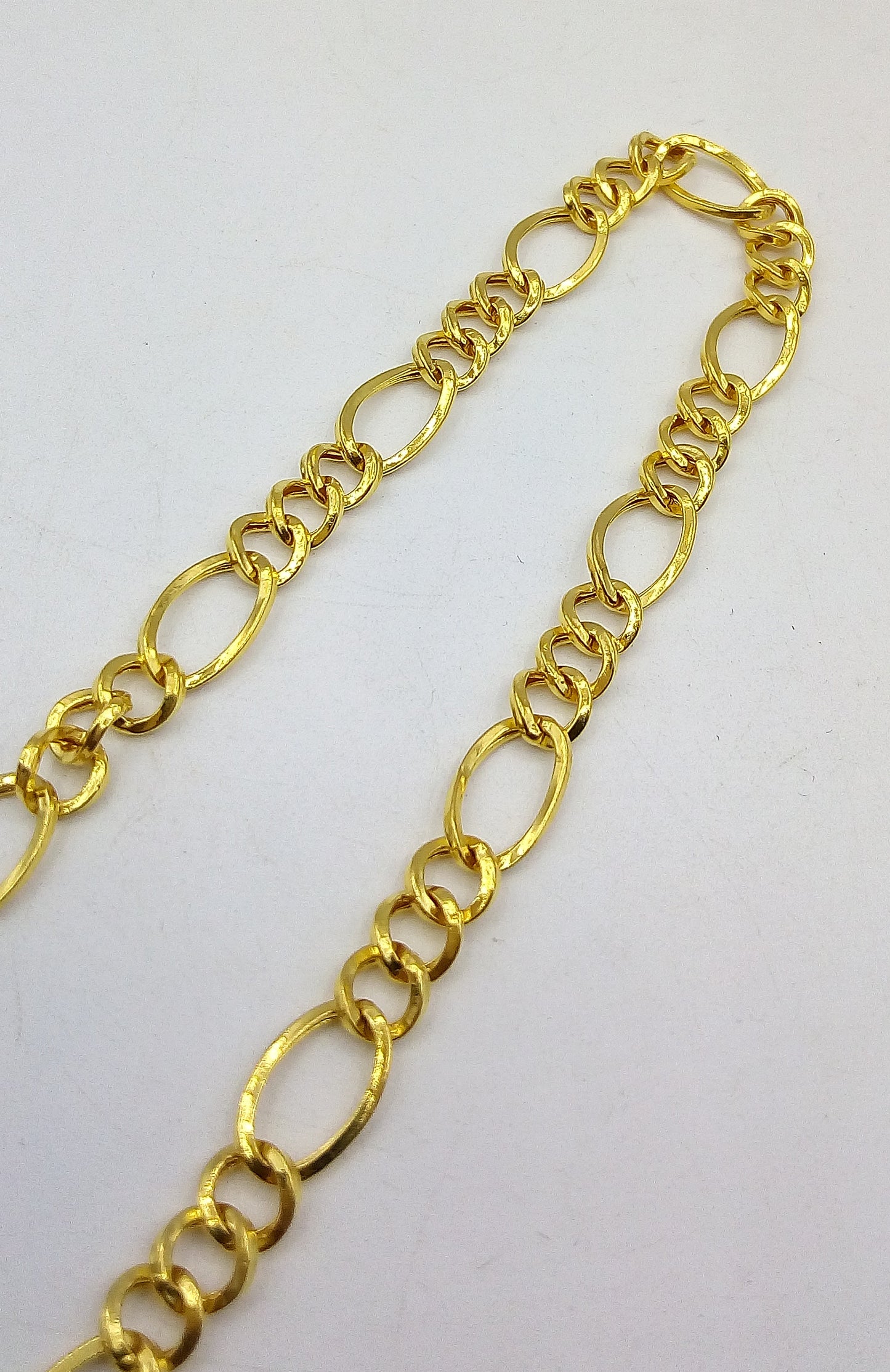 22K yellow gold handmade Figaro link chain necklace by Tribal Ornaments, lightweight unisex design with hallmarked certification.