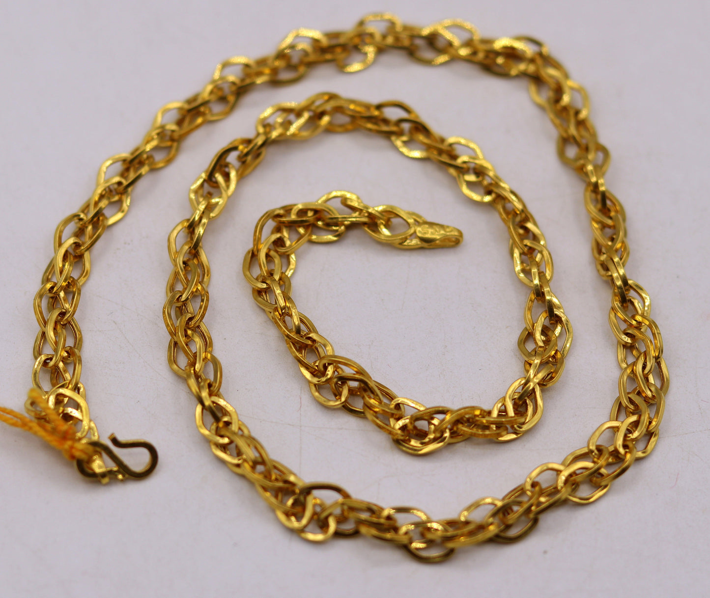22K yellow gold handmade multi-link chain necklace by TRIBAL ORNAMENTS, unisex solid gold jewelry for gifting or everyday wear.