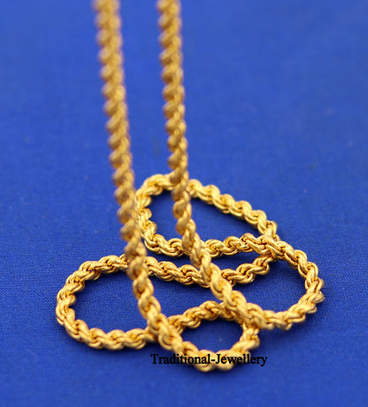 22K yellow gold handmade rope chain necklace, 3mm wide, unisex design with hallmarked finish, available in all lengths.