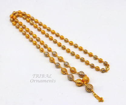 22KT yellow gold beaded chain necklace by TRIBAL ORNAMENTS, handmade Indian wedding jewelry with white gold rhodium accents.