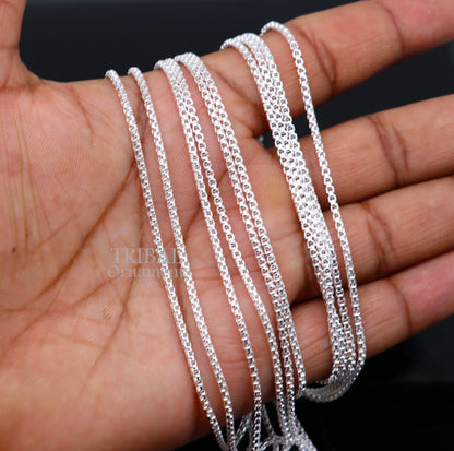 Sterling silver 2mm Rolo chain necklace by Tribal Ornaments, stylish, delicate, unisex solid jewelry for gifting or everyday wear.