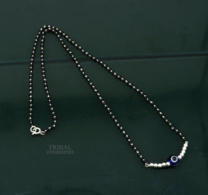 925 sterling silver black beads chain necklace with a small evil eye pendant, featuring traditional beaded design and intricate craftsmanship.