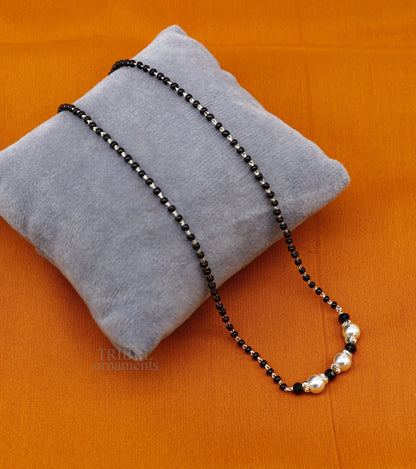 Sterling silver black beads chain necklace with small silver bead pendant, traditional style beaded jewelry from Tribal Ornaments.