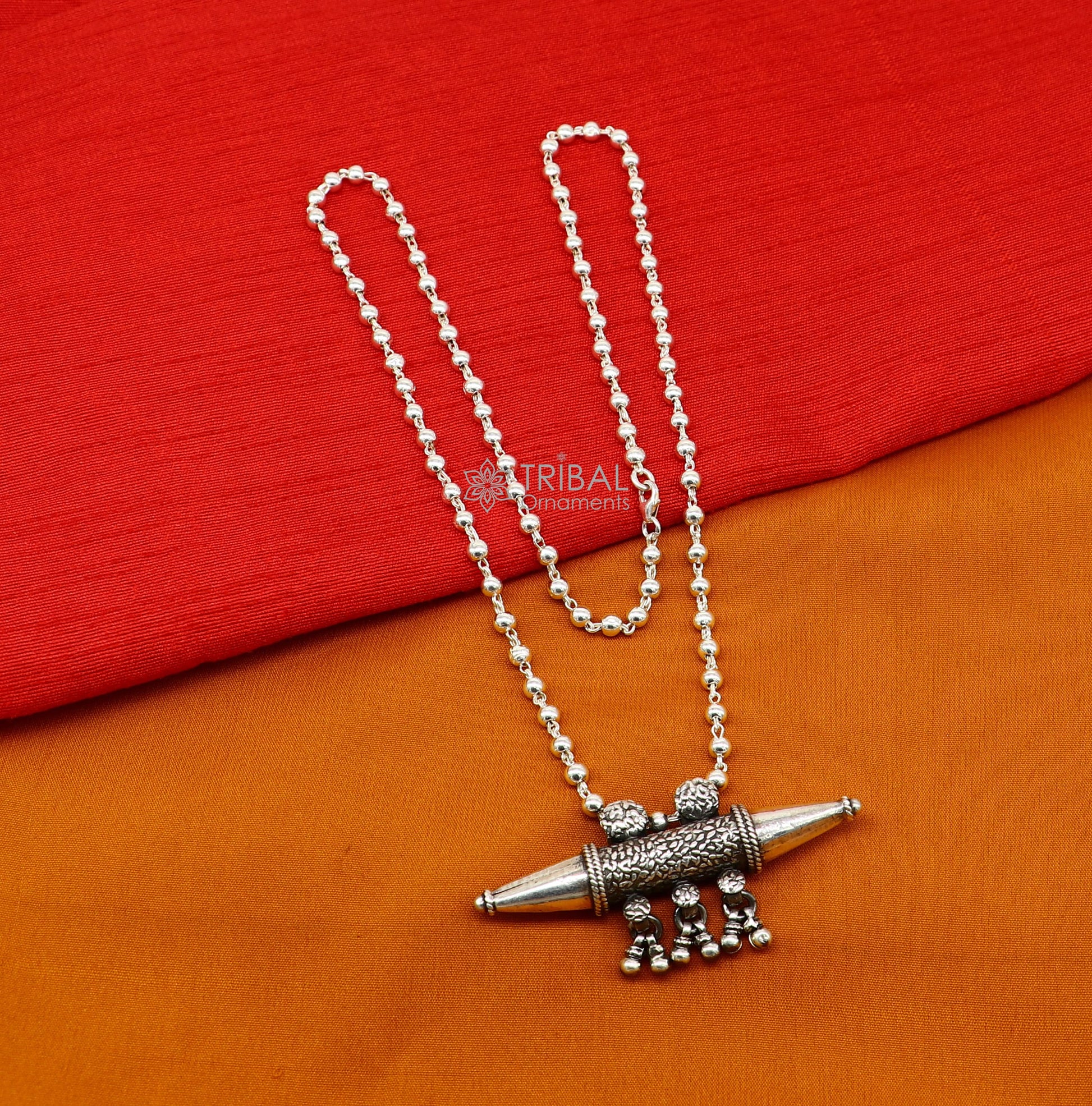925 sterling silver vintage tribal pendant necklace with hanging bells, handcrafted ethnic jewelry from Rajasthan.