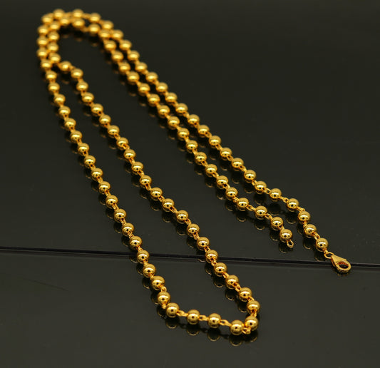 Sterling silver beaded necklace with gold polish by TRIBAL ORNAMENTS, stylish unisex jewelry perfect for gifting and everyday wear.