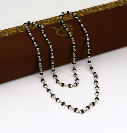 Sterling silver Basil Rosary Tulsi Bead Mala chain, 24-inch, 4mm width, with silver side caps and handmade knot detail.