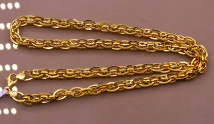 Handmade 22K yellow gold chain necklace, 7mm wide Indian designer jewelry with 916 hallmark, featuring intricate craftsmanship.
