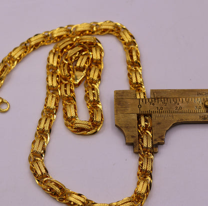 Handmade 22K yellow gold designer chain necklace, 7mm wide, showcasing intricate Indian craftsmanship and elegant jewelry design.