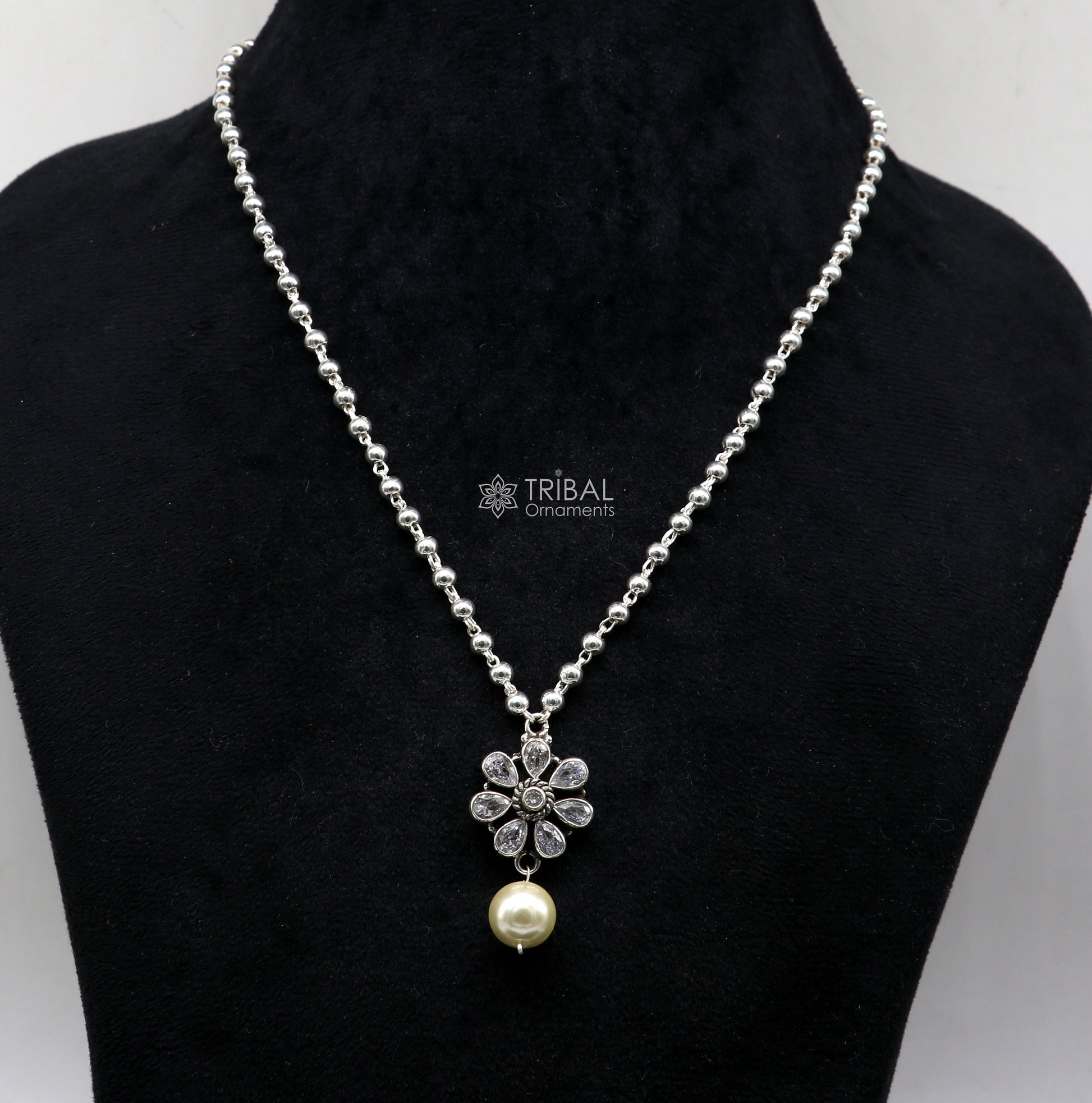 Sterling silver beads ball chain necklace with flower pendant and hanging pearl, part of Tribal Ornaments jewelry set.