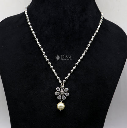 Sterling silver beads ball chain necklace with flower pendant and hanging pearl, part of Tribal Ornaments jewelry set.