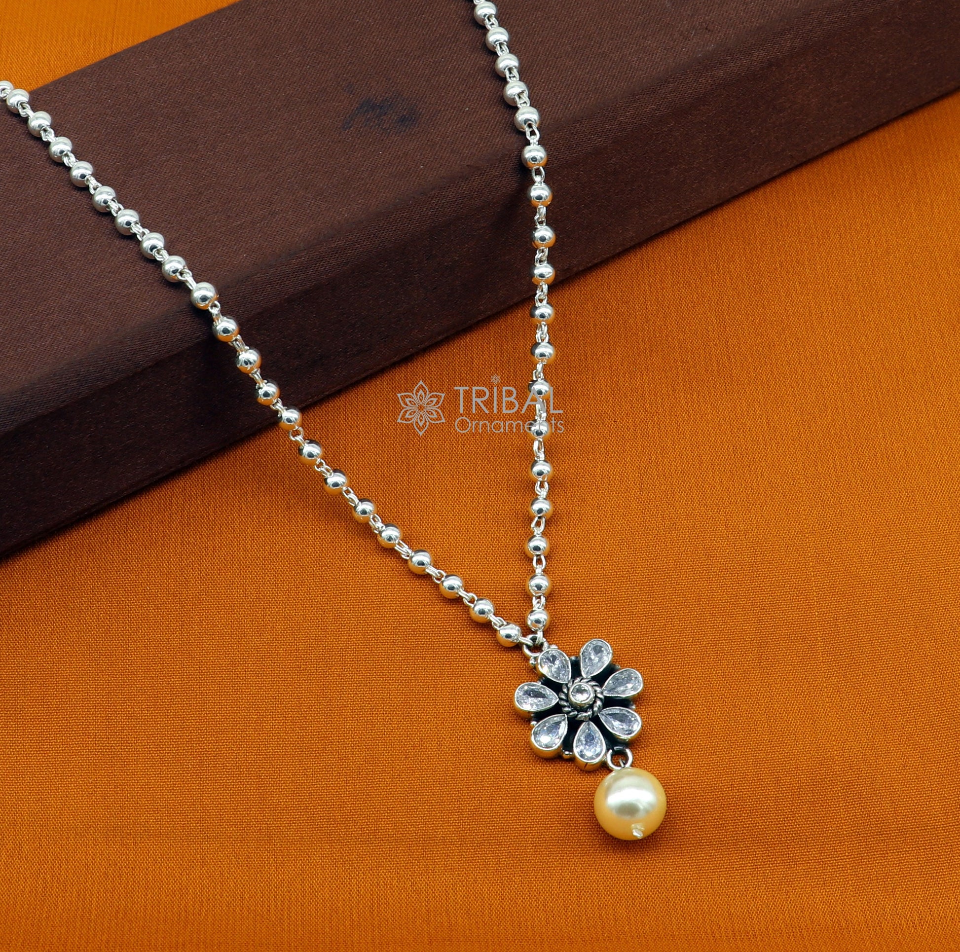 Sterling silver beads ball chain necklace with flower pendant and hanging pearl, part of TRIBAL ORNAMENTS jewelry set.