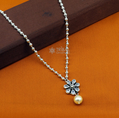 Sterling silver beads ball chain necklace with flower pendant and hanging pearl, part of TRIBAL ORNAMENTS jewelry set.