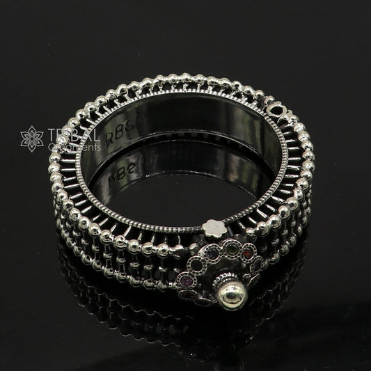 Vintage 925 sterling silver bangle cuff bracelet with intricate tribal design, handmade bridal jewelry by Tribal Ornaments.
