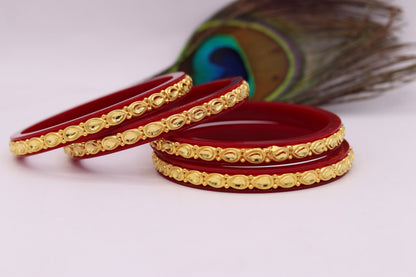 Vintage 22kt yellow gold Tussi pattern bangle bracelet pair with intricate Indian traditional design for wedding or special occasions.