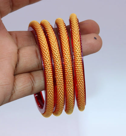Vintage 22KT yellow gold tribal bangle bracelet with intricate handmade design, traditional bridal jewelry from India.