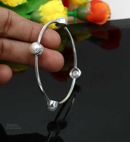 Sterling silver bangle with freshwater pearls, handmade tribal jewelry by TRIBAL ORNAMENTS, stylish and customized tribal kada.