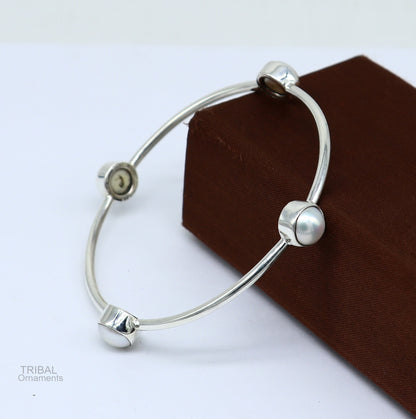 Sterling silver bangle with fresh water pearl, handcrafted tribal jewelry by TRIBAL ORNAMENTS, stylish and culturally inspired.