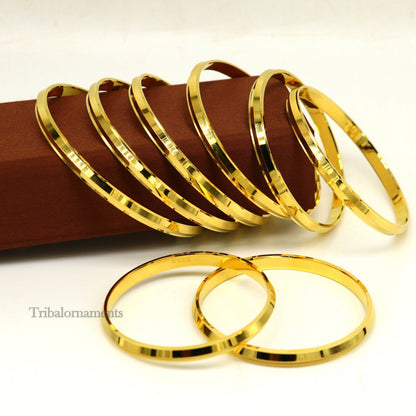 Sterling silver Punjabi Sikkh Kada bracelet by TRIBAL ORNAMENTS, gold-polished solid silver jewelry with traditional Rajputi design