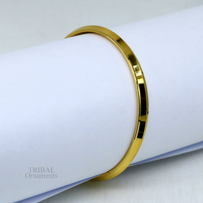 Sterling silver Punjabi Sikh Kada bangle with gold polish, handmade Rajputi design, crafted by TRIBAL ORNAMENTS.