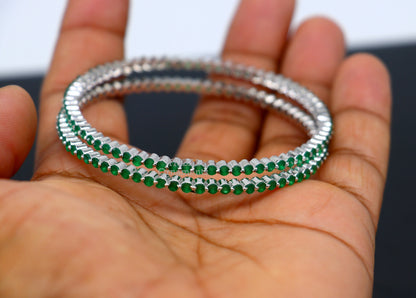 Sterling silver TRIBAL ORNAMENTS green cubic zircon bangle bracelet, handmade jewelry for women, stylish and elegant accessory.
