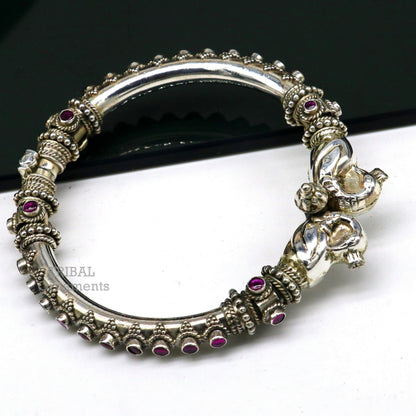 Sterling silver tribal bangle bracelet with peacock design and cubic zircon stones, handmade ethnic jewelry by Tribal Ornaments