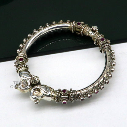 Sterling silver peacock tribal bangle bracelet with cubic zircon stones, handmade ethnic jewelry with vintage tribal design.
