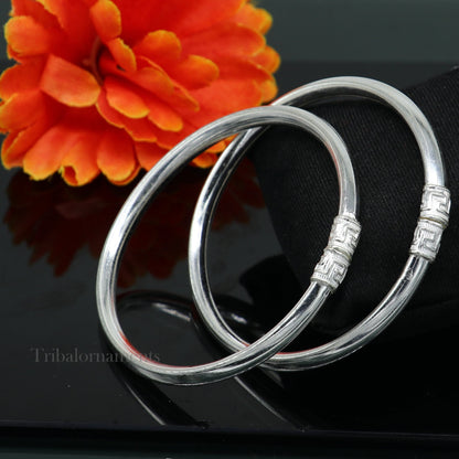 Sterling silver half-round bangle bracelet with tribal design, handmade jewelry from TRIBAL ORNAMENTS featuring intricate patterns.