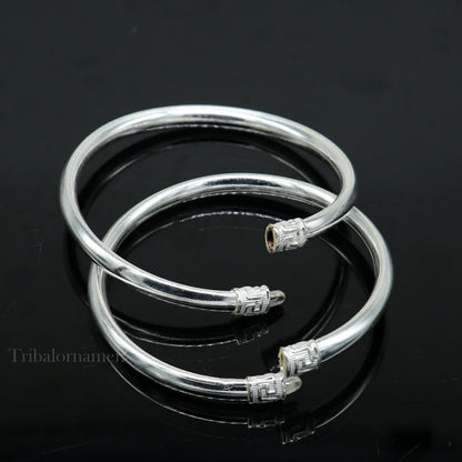 Sterling silver half-round bangle bracelet with tribal-inspired design from Tribal Ornaments, perfect as a handmade jewelry gift.
