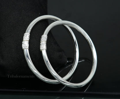 Sterling silver half-round bangle bracelet with tribal-inspired handmade design, crafted by TRIBAL ORNAMENTS.