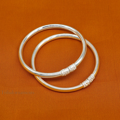 Sterling silver half-round tribal bangle bracelet with intricate handmade design, perfect as a tribal jewelry gift.