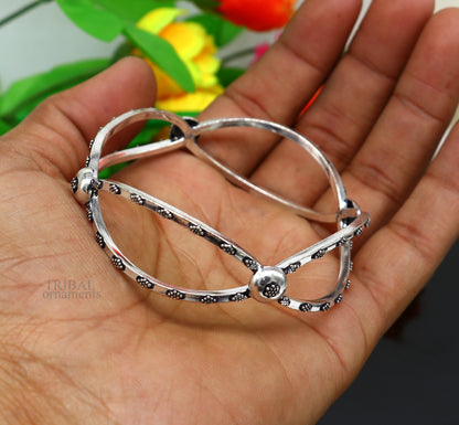 Sterling silver bangle bracelet by TRIBAL ORNAMENTS, featuring intricate belly dance jewelry design and customized details.
