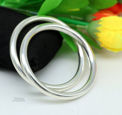 Sterling silver bangle bracelet by TRIBAL ORNAMENTS, shiny and smooth, stylish kada suitable for men or girls, ideal for gifting.