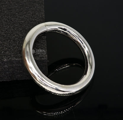 Sterling silver bangle bracelet by TRIBAL ORNAMENTS, plain shiny unisex jewelry, handmade and personalized, 12mm width.