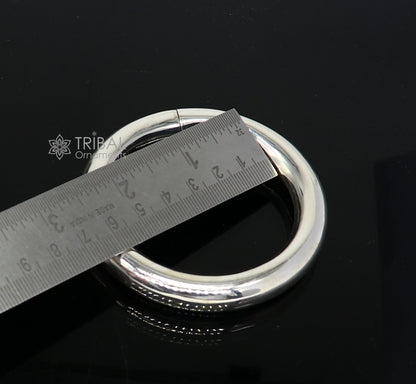 925 sterling silver bangle bracelet by TRIBAL ORNAMENTS featuring a plain shine finish, unisex design, perfect for personalized jewelry.