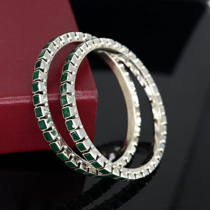 925 sterling silver bangle bracelet with green square-shaped stone, tribal ornament design, ideal for anniversary gifting.