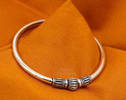 Sterling silver single ball bangle bracelet with shiny plain design, stylish bridal jewelry, perfect for belly dance accessories.