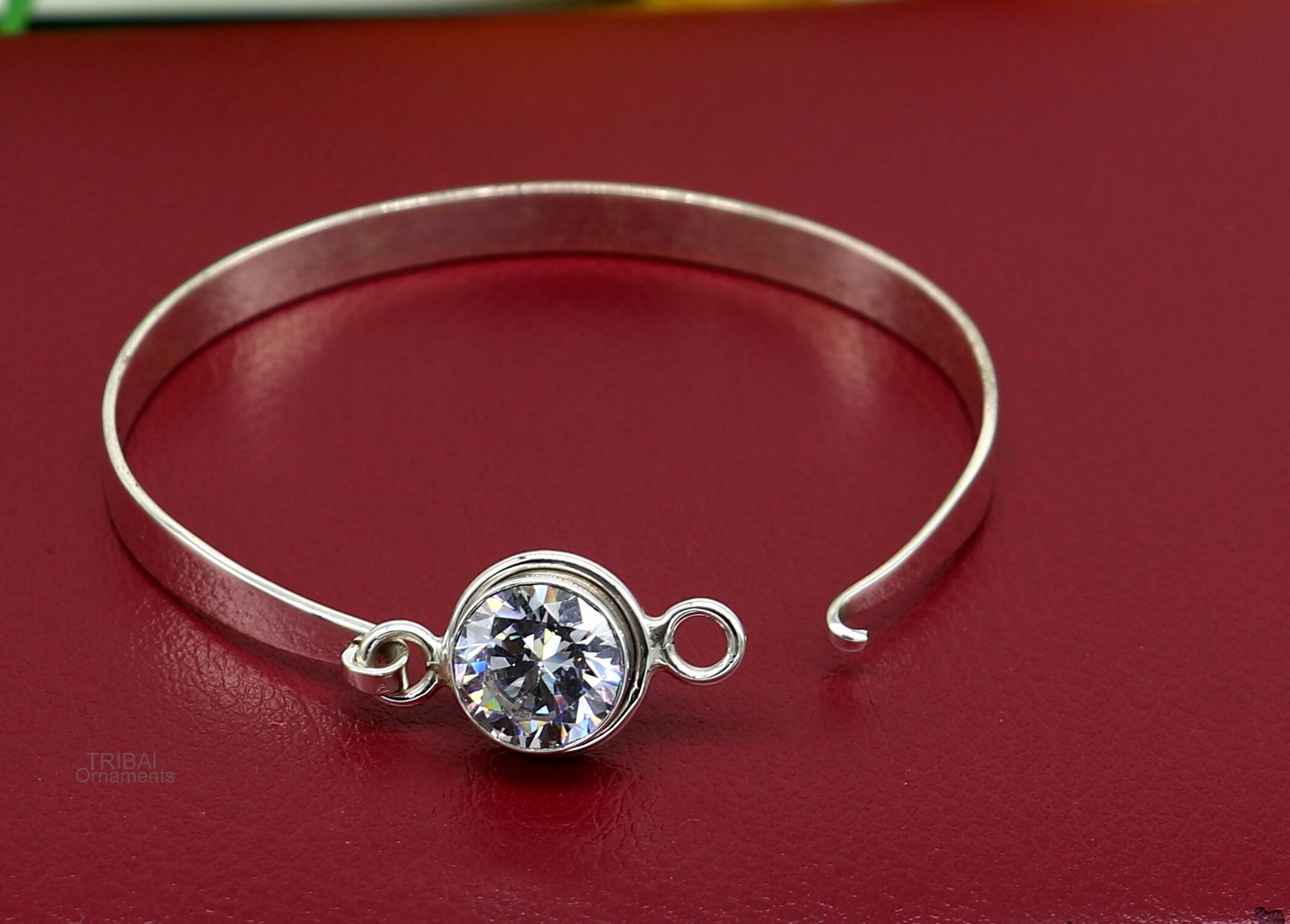 Elegant 925 sterling silver cubic zirconia bangle bracelet with intricate design, perfect for gifting or stylish girl’s jewelry.