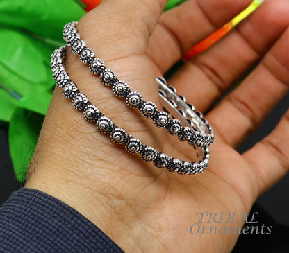 Elegant 925 sterling silver flower design bangle bracelet from Tribal Ornaments, perfect for wedding jewelry and bridal collection.