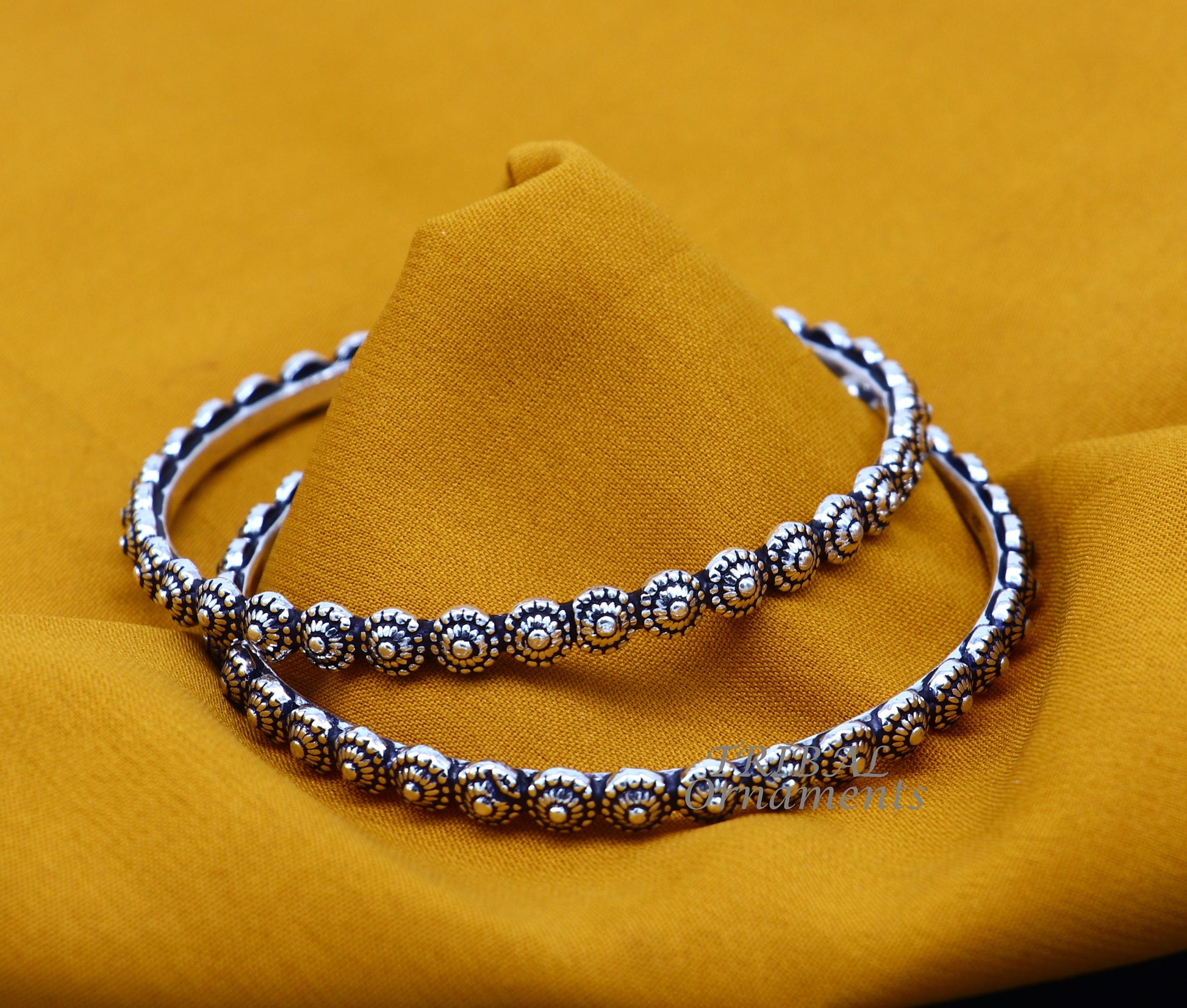 Elegant 925 sterling silver flower design bangle bracelet from Tribal Ornaments, perfect for bridal wedding jewelry.